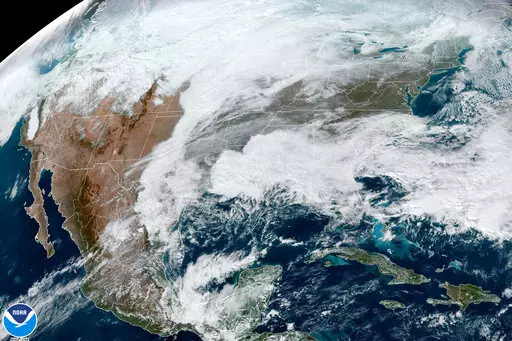 This satellite image made available by NOAA shows cloud cover over North America on Dec. 21, 2022, at 1:31 p.m. The nation’s largest public utility has appointed an independent panel to look into power failures that spurred the decision to implement rolling blackouts during dangerously cold conditions late last year, Tennessee Valley Authority announced Thursday, Jan. 19, 2023. (NOAA via AP, File)