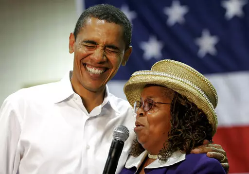 Presidential hopeful Sen. Barack Obama, D-Ill., left, laughs with Greenwood County, S.C., Council Woman, Edith Childs, right, in Aiken, S.C., on Oct. 6, 2007. Obama is marking the retirement of the South Carolina woman credited with popularizing the chant "Fired up, ready to go!" The chant came to epitomize Obama's two presidential campaigns. The former president says Childs' energy played a key role in lifting his spirits and his candidacy. (AP Photo/Brett Flashnick, File)