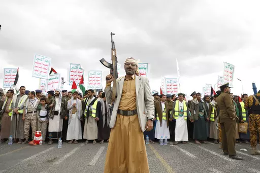 Houthi supporters attend a rally against the U.S.-led airstrikes on Yemen and in support of the Palestinians in the Gaza Strip on Yemen, in Sanaa, Yemen, Friday, Feb. 09, 2024. Despite a month of U.S.-led airstrikes, Yemen's Iranian-backed Houthi rebels have launched attacks seriously damaging a ship in the crucial Bab el-Mandeb Strait and apparently bringing down an American drone worth tens of millions of dollars. (AP Photo/Osamah Abdulrahman, File)