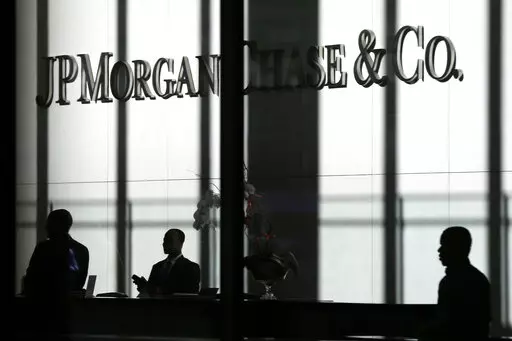 The JPMorgan Chase & Co. logo is displayed at their headquarters in New York on Oct. 21, 2013. You'll no longer be able to store your precious coins, jewelry and paperwork at JPMorgan Chase & Co., as the bank has stopped opening new safety deposit boxes for customers. A spokesman for the bank said Chase decided late last year to stop offering new deposit boxes to customers as a “business decision” but declined to share specifics. (AP Photo/Seth Wenig, File)