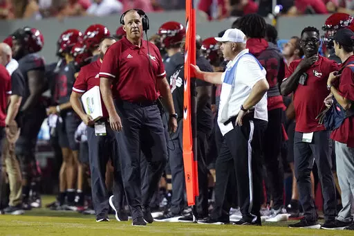 North Carolina State head coach Dave Doeren looks on during the second half of an NCAA college football game against South Florida in Raleigh, N.C., Thursday, Sept. 2, 2021. (AP Photo/Gerry Broome)