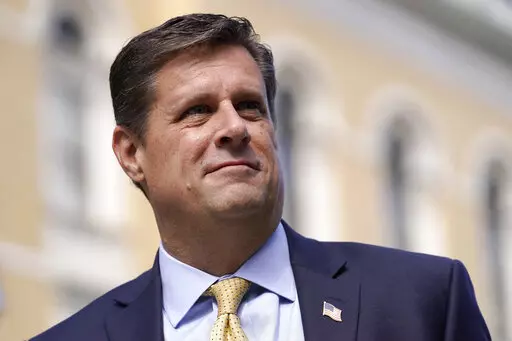 Republican gubernatorial candidate Geoff Diehl speaks to reporters outside the Statehouse, in Boston, March 21, 2022. Diehl, who has former President Donald Trump’s endorsement, is going up against businessman Chris Doughty, a political newcomer, in the Republican primary for governor on Tuesday, Sept. 6. (AP Photo/Steven Senne, File)