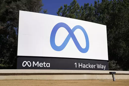 Facebook's Meta logo sign is seen at the company headquarters in Menlo Park, Calif. on Oct. 28, 2021. According to a report released Thursday, June 9, 2022, Facebook and parent company Meta once again failed to detect blatant, violent hate speech in advertisements submitted to the platform by the nonprofit groups Global Witness and Foxglove. (AP Photo/Tony Avelar, File)
