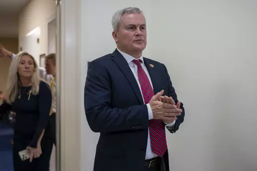 House Oversight and Accountability Committee Chairman James Comer, R-Ky., emerges from the committee room, followed by Rep. Marjorie Taylor Greene, R-Ga., to speak to reporters after Hunter Biden, President Joe Biden's son, defied a congressional subpoena to appear privately for a deposition before Republican investigators who have been digging into his business dealings, at the Capitol in Washington, Wednesday, Dec. 13, 2023. (AP Photo/J. Scott Applewhite, File)