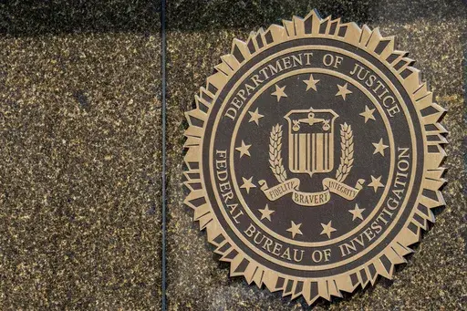 The seal on the J. Edgar Hoover FBI Building is seen June 9, 2023, in Washington. (AP Photo/Alex Brandon, File)