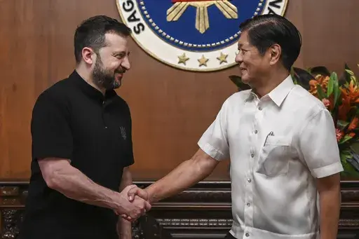 Ukraine's President Volodymyr Zelenskyy, left, meets Philippine President Ferdinand Marcos Jr. at the Malacanang presidential palace in Manila, Philippines on Monday June 3, 2024.(Jam Sta Rosa/Pool Photo via AP)