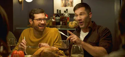 This image released by Universal Pictures shows Billy Eichner, left, and Luke Macfarlane in a scene from "Bros." (Universal Pictures via AP)