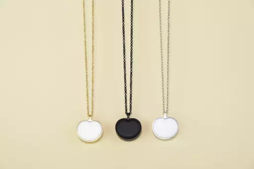 This image provided by Bond-Touch shows the Bond Heart smart necklace, which stores and plays heartbeats with the help of an app. Think outside the box for Mother's Day gifts this year. (Bond-Touch via AP).