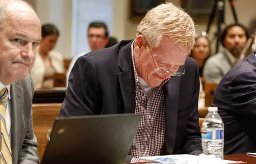 Alex Murdaugh becomes emotional after seeing his family in the courtroom as opening statements begin in his double murder trial at the Colleton County Courthouse in Walterboro, S.C, Wednesday, Jan. 25, 2023. (Grace Beahm Alford/The State via AP)