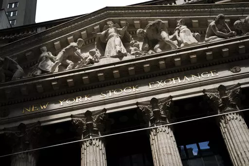 Statues adorn the facade of the New York Stock Exchange Thursday, July 14, 2022, in New York.  Stocks are opening higher on Wall Street, Friday, Sept. 2,  after a solid report on the jobs market last month that also didn't came in too high.(AP Photo/John Minchillo, File)