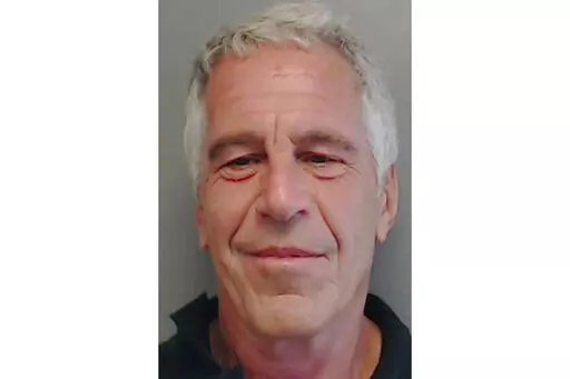 This image provided by the Florida Department of Law Enforcement shows financier Jeffrey Epstein, on July 25, 2013. A statement released on Sunday, Jan 1, 2023, by the governor of the U.S. Virgin Islands, relieved of her duties the attorney general who pursued various cases against disgraced financier Jeffrey Epstein, including a lengthy legal fight that resulted in a $105 million settlement. (Florida Department of Law Enforcement via AP File)
