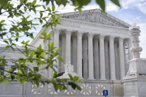 The Supreme Court building is seen on June 27, 2024, in Washington. Supreme Court justices will take the bench Monday, July 1, to release their last few opinions of the term, including their most closely watched case: whether former President Donald Trump has immunity from criminal prosecution. (AP Photo/Mark Schiefelbein, File)