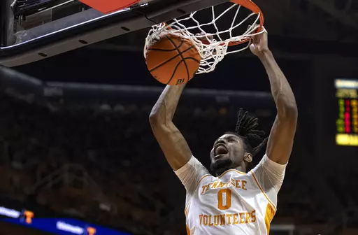 Tennessee forward Jonas Aidoo (0) dunks the ball during the first half of an NCAA college basketball game against Mississippi Saturday, Jan. 6, 2024, in Knoxville, Tenn. (AP Photo/Wade Payne)
