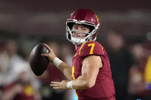 Southern California quarterback Miller Moss passes during the first half of an NCAA college football game against Utah State, Saturday, Sept. 7, 2024, in Los Angeles. (AP Photo/Mark J. Terrill)