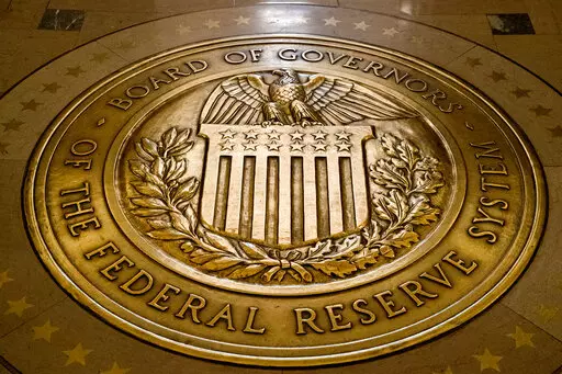 FILE- In this Feb. 5, 2018, file photo, the seal of the Board of Governors of the United States Federal Reserve System is displayed in the ground at the Marriner S. Eccles Federal Reserve Board Building in Washington.Richmond Federal Reserve President Thomas Barkin on Friday, Feb. 17, 2023 downplayed recent signs that the economy is strengthening, but also said he is prepared to keep raising interest rates in smaller increments as often as needed to quell inflation. (AP Photo/Andrew Harnik, File