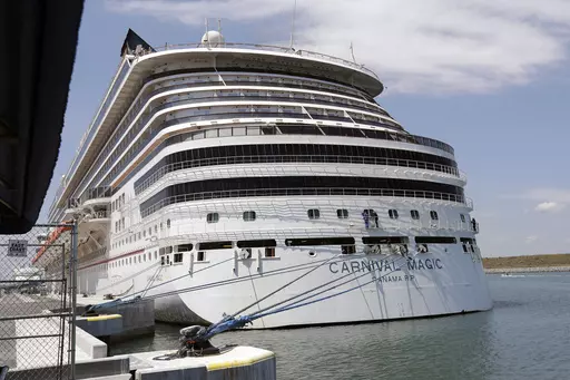The Carnival cruise line ship Carnival Magic sits docked on April, 2020, in Cape Canaveral, Fla. The U.S. Coast Guard said Tuesday, May 30, 2023, that it's searching for a man who fell from a cruise ship off the coast of Florida. The 35-year-old was on the Carnival Magic when he fell from the ship about 186 miles east of Jacksonville, Fla., on Monday, May 29. (AP Photo/John Raoux, File)