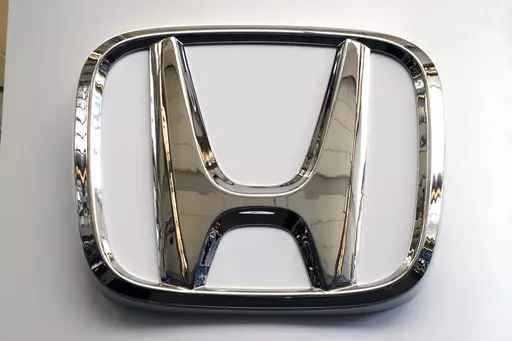 FILE- This Feb. 14, 2019 file photo shows a Honda logo at the 2019 Pittsburgh International Auto Show in Pittsburgh. Honda is recalling a half-million vehicles in the U.S. and Canada, Wednesday, March 15, 2023, because the front seat belts may not latch properly. The recall covers some of the the automaker’s top-selling models including the 2017 through 2020 CR-V, the 2018 and 2019 Accord, the 2018 through 2020 Odyssey and the 2019 Insight. Also included is the Acura RDX from the 2019 and 2020