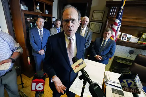 Mississippi Lt. Gov. Delbert Hosemann, a Republican, is backed by some senators as he discusses health care legislation during a news conference in his office at the state Capitol in Jackson, on Wednesday, Jan. 18, 2023. (AP Photo/Rogelio V. Solis)