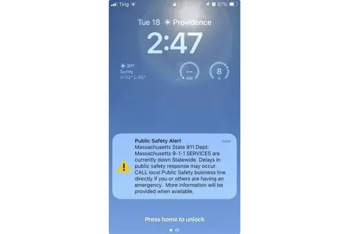 This alert screen, seen on a mobile phone in Providence, Rhode Island, shows a notification alerting users that the 9-1-1 emergency system is currently down. The 911 system across Massachusetts went down Tuesday afternoon, June 18, 2024, making it impossible for anyone to reach emergency services. (AP Photo/Michelle Smith)