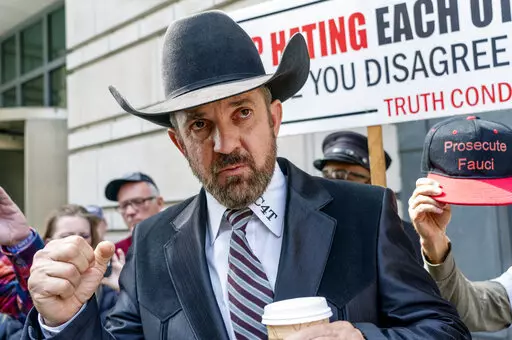 Otero County, N.M., Commissioner Couy Griffin stands outside the federal court after receiving a verdict in his trial on March 22, 2022 in Washington. New Mexico’s secretary of state asked the state's Supreme Court on Tuesday, June 14, 2022, to order the Republican-led commission of rural Otero County to certify primary election results after it refused to do so over distrust of Dominion vote-tallying machines. (AP Photo/Gemunu Amarasinghe, File)