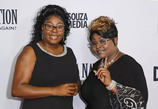 Lynnette Hardaway, left, and Rochelle Richardson, a.k.a. Diamond and Silk, arrive at the LA Premiere of "Death of a Nation" at the Regal Cinemas at L.A. Live on July 31, 2018, in Los Angeles. Hardaway, known by the moniker “Diamond” of the conservative political commentary duo "Diamond and Silk", has died, former President Donald Trump and the pair's official Twitter account announced Monday, Jan. 9, 2023. She was 51. (Photo by Willy Sanjuan/Invision/AP, File)
