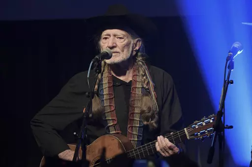 Willie Nelson performs at the Producers & Engineers Wing 12th Annual GRAMMY Week Celebration in Los Angeles on Feb. 6, 2019. The country legend's new book, “Energy Follows Thought,” gives the stories behind his most famous songs. (Photo by Richard Shotwell/Invision/AP, File)