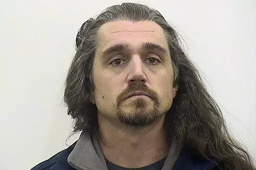 This booking image provided by Adams County, Illl., administration, shows Timothy Bliefnick of Quincy, Ill., who has been charged charged with first-degree murder in the death of his estranged wife, Rebecca Bliefnick. On Friday, Aug. 11, 2023, a judge sentenced Bliefnick, a former contestant on the television game show “Family Feud,” to life in prison after he was convicted of first-degree murder in the slaying of his estranged wife in western Illinois. (Adams County, Illl., Administration v