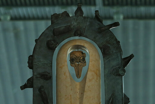 An altar constructed from recycled material of a vaquita porpoise skull is pictured during a march in support of the endangered porpoise, in Mexico City, Feb. 17, 2018.  The U.S. Trade Representative’s Office filed the first environmental complaint against Mexico Thursday, Feb. 10, 2022, for failing to protect the critically endangered vaquita marina, the world’s smallest porpoise. (AP Photo/Marco Ugarte, File)