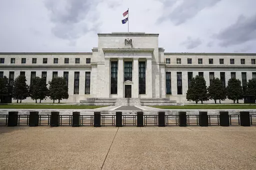 In this May 4, 2021 file photo is the Federal Reserve in Washington. Americans' financial health reached its highest level in nearly a decade last year, the Federal Reserve said Monday, May 23, 2022 spurred by a strong job market and government support payments. (AP Photo/Patrick Semansky, File)
