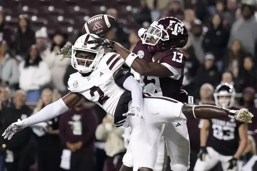 Mississippi State cornerback Esaias Furdge (2) breaks up a pass intended for Texas A&M wide receiver Micah Tease (13) in the end zone during the fourth quarter of an NCAA college football game Saturday, Nov. 11, 2023, in College Station, Texas. (AP Photo/Sam Craft)