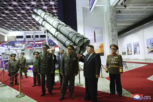 In this photo provided by the North Korean government, North Korean leader Kim Jong Un, second right, and Russian Defense Minister Sergei Shoigu, third right, visit an arms exhibition in Pyongyang, North Korea on July 26, 2023. Independent journalists were not given access to cover the event depicted in this image distributed by the North Korean government. The content of this image is as provided and cannot be independently verified. Korean language watermark on image as provided by source read