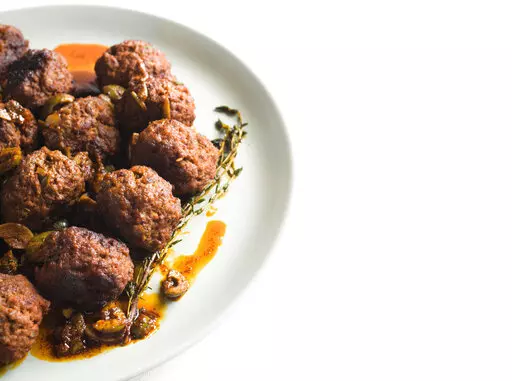 This image released by Milk Street shows a recipe for Spanish Meatballs. (Milk Street via AP)