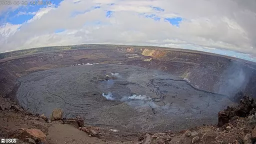 This webcam image provided by the U.S. Geological Survey shows the summit of the Kilauea volcano in Hawaii, Tuesday, June 20, 2023. An eruption of the Hawaii volcano that began nearly two weeks earlier has come to a pause, scientists said. Kilauea, one of the most active volcanoes in the world, began erupting June 7 after a three-month pause, displaying fountains of glowing red lava without threatening any communities or structures. (U.S. Geological Survey via AP)