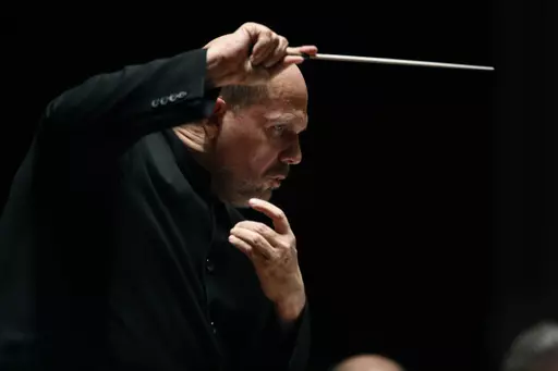 In this Jan. 8, 2015, photo, Jaap van Zweden conducts the Dallas Symphony Orchestra in Dallas. Jaap van Zweden will conduct Mahler’s Second Symphony in his farewell concerts as the New York Philharmonic’s music director from June 6-8, 2024, ending a season that will spotlight the 100th anniversary of the orchestra’s Young People’s Concerts. Van Zweden succeeded Alan Gilbert as music director in the 2018-19 season and announced in September 2021 that the 2023-24 season will be his last. (