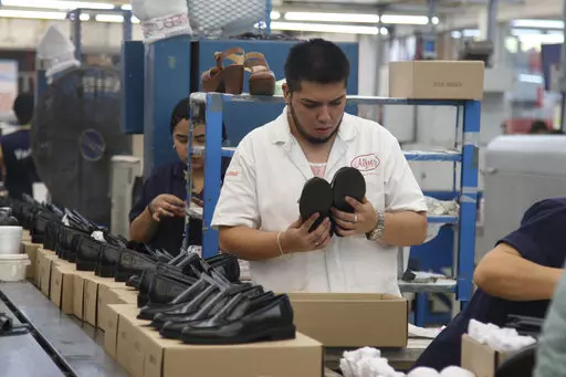 People work in a shoe maquiladora or factory in Leon, Mexico, Monday, Feb. 7, 2023. t has been nearly two years since the United States began pressing Mexico over labor rights violations, by using rapid dispute resolution methods (RRM) contained in the U.S.-Mexico Canada free trade agreement. (AP Photo/Mario Armas)