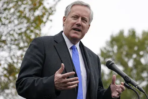 White House chief of staff Mark Meadows speaks with reporters outside the White House, Monday, Oct. 26, 2020, in Washington. (AP Photo/Patrick Semansky, File)