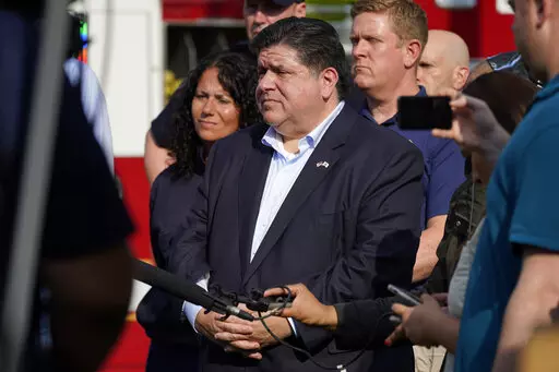 Illinois Gov. J.B. Pritzker attends a news conference at Highland Park Fire Department station 33., after a mass shooting at the Highland Park Fourth of July parade in downtown Highland Park, July 4, 2022. As President Joe Biden runs up against the limits of what he can do on abortion, gun control and other issues without larger Democratic majorities in Congress, some in his party want more fire and boldness than the president's acknowledgement of their frustration and calls imploring people to 