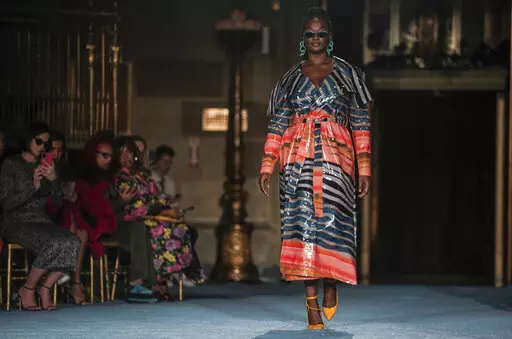 The latest fashion from Christian Siriano is modeled during New York's Fashion Week, Tuesday, Sept. 7, 2021. (AP Photo/Bebeto Matthews)