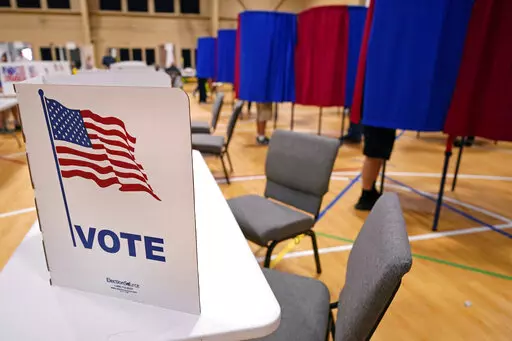Voters cast their ballots at a polling station in Derry, N.H., on Tuesday, Sept. 13, 2022. (AP Photo/Charles Krupa, File)