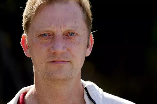 U.S. Navy veteran Michael White stands for a portrait Jan. 13, 2021, in San Diego. White, who was jailed in Iran for nearly two years, sued the Iranian government on Thursday, March 17, 2022, for $1 billion, alleging that he was kidnapped, held hostage and tortured. (AP Photo/Gregory Bull, File)