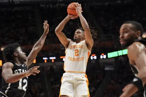Tennessee guard Chaz Lanier (2) shoots the ball over Mississippi State guard Josh Hubbard (12) during the first half of an NCAA college basketball game Tuesday, Jan. 21, 2025, in Knoxville, Tenn. (AP Photo/George Walker IV)