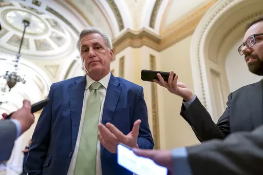 House Minority Leader Kevin McCarthy, R-Calif., talks to reporters at the Capitol in Washington, April 6, 2022. McCarthy is downplaying secretly recorded remarks he made about Donald Trump shortly after last year's attack on the Capitol. He also says he never told the then-president that he should resign — something that has not been reported. (AP Photo/J. Scott Applewhite, File)