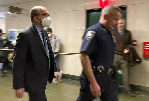 Donald Bender, left, a former accountant for Donald Trump, arrives at Manhattan criminal court, Monday, Nov. 21, 2022, in New York. Prosecutors in the Trump Organization's criminal tax fraud trial rested their case Monday earlier than expected, pinning hopes for convicting Donald Trump's company largely on the word of two top executives who cut deals before testifying they schemed to avoid taxes on company-paid perks. (AP Photo/Michael Sisak)