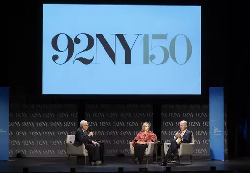 Former President Bill Clinton, right, and former Secretary of State Hillary Rodham Clinton, center, speak with David Rubenstein at the 92nd Street Y on May 4, 2023, in New York. Oprah Winfrey, Rachel Maddow and Arnold Schwarzenegger will be among those appearing this fall at the 92nd Street Y, a New York City cultural institution and community center marking its 150th anniversary. (Photo by Evan Agostini/Invision/AP, File)