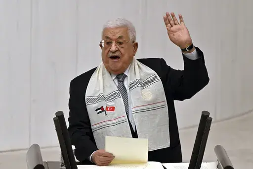 Palestinian President Mahmoud Abbas, addresses a speech during an extraordinary Parliamentary Meeting on Palestinians, at the Turkish Parliament in Ankara, Turkey, Thursday, Aug. 15, 2024. (AP Photo/Ali Unal)