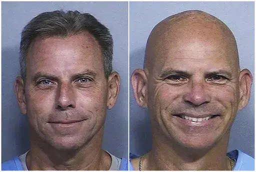 This combination of two booking photos provided by the California Department of Corrections shows Erik Menendez, left, and Lyle Menendez. (California Dept. of Corrections via AP, File)