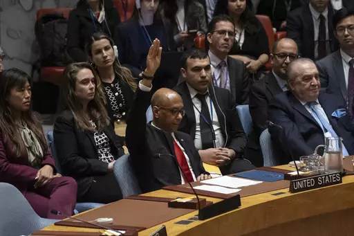 U.S. Deputy Ambassador Robert Wood votes against resolution during a Security Council meeting at United Nations headquarters, Thursday, April 18, 2024. (AP Photo/Yuki Iwamura)