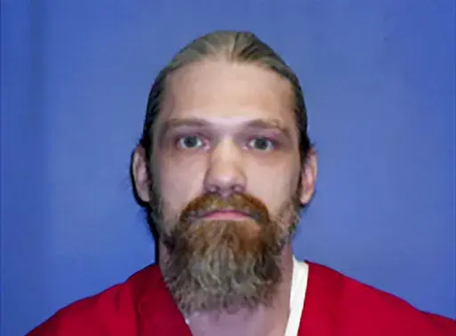 This undated file photo provided by the Mississippi Department of Corrections shows death row inmate Blayde Grayson. A state circuit judge issued an order Monday, April 11, 2022, saying Grayson told her under oath that he wants to keep appealing his case. That was a reversal from when Grayson told the state Supreme Court in December 2021 that he wanted to relinquish all appeals and request an execution date. Justices ordered King to put Grayson under oath to say what he wants. (Mississippi Depar