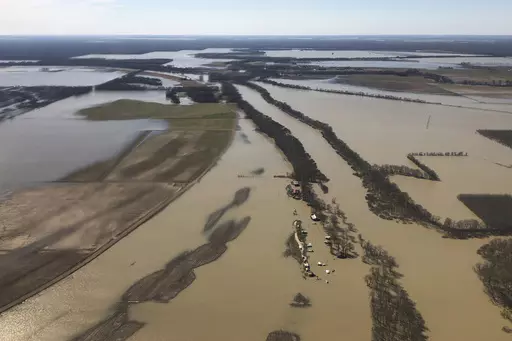 Backwater flooding covers stretches of farm land on March 17, 2019, near Yazoo City, Miss. Federal officials presented a proposal Thursday, May 4, 2023, to further control flooding in the Mississippi Delta, a move that comes after months of work from government agencies and decades of delays amid disputes over potential environmental impacts. (AP Photo/Holbrook Mohr, File)