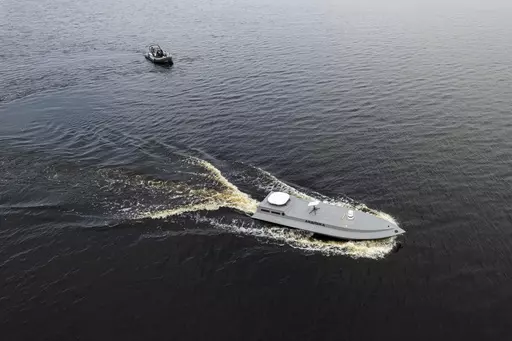 A sea drone cruises on the water during a presentation by Ukraine's Security Service in Kyiv region, Ukraine, on Tuesday, March 5, 2024. (AP Photo/Evgeniy Maloletka, File)